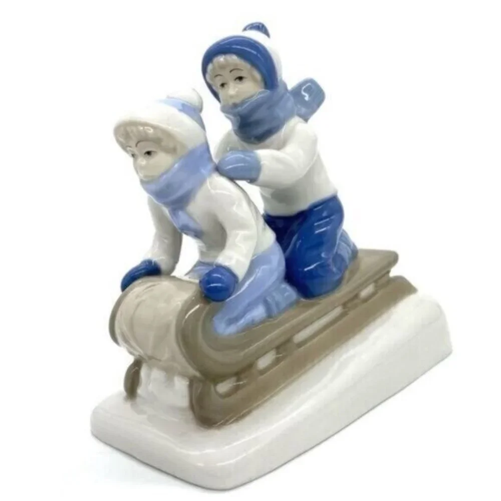 Paul Sebastian Children Sledding Porcelain Figurine Collectable